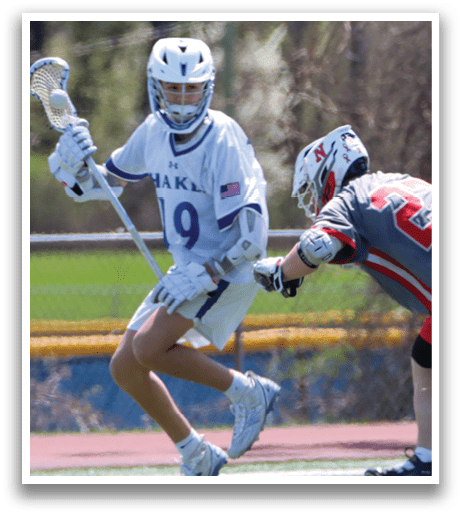 Two lacrosse players on a field, one with a stick and the other with a helmet. AI generated content