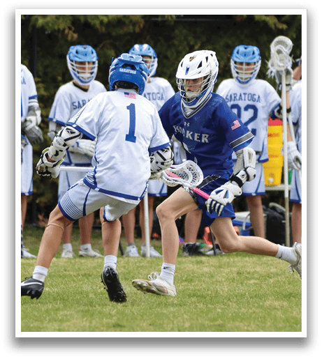A group of young men playing lacrosse on a field. AI generated content