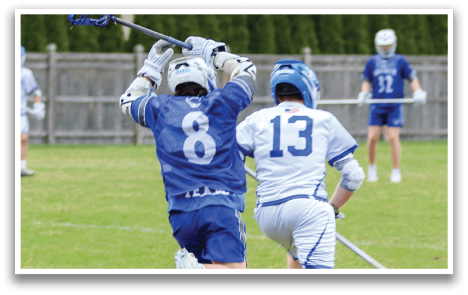 Two men playing lacrosse on a field. One man is running with a stick in his hand. AI generated content