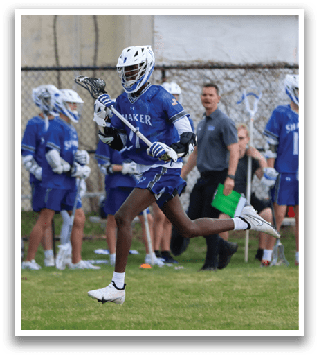 A group of young men playing a game of lacrosse on a field. AI generated content