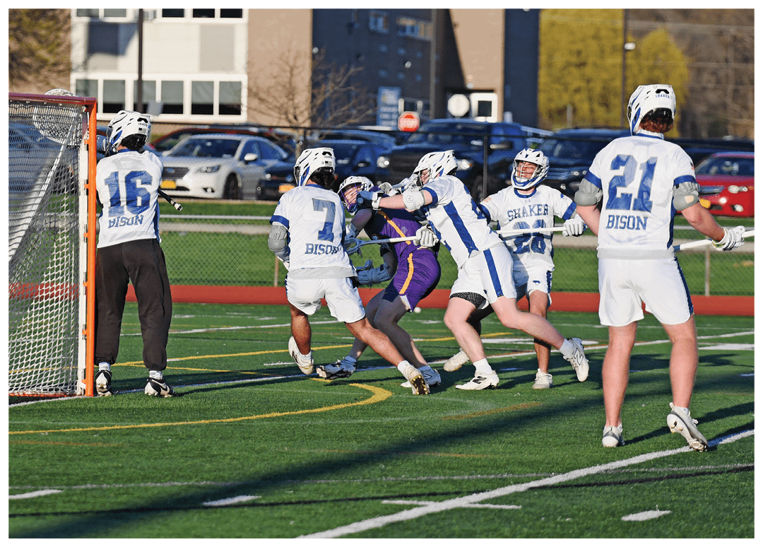 A group of young men playing a game of lacrosse. AI generated content