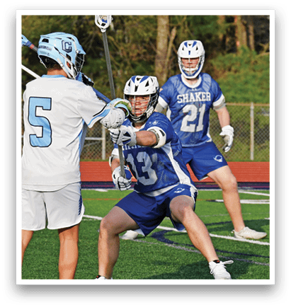 Three young men playing lacrosse on a field. AI generated content