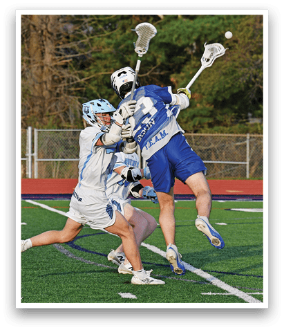 Two men playing lacrosse on a field. One man is trying to get past the other. AI generated content