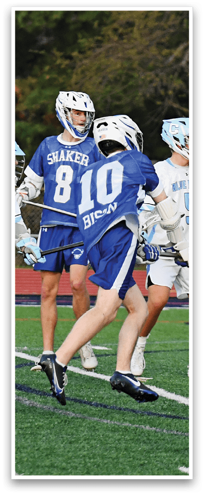 Three people playing lacrosse on a field. AI generated content