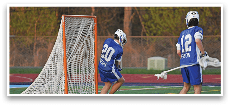 Two men playing lacrosse on a field. AI generated content