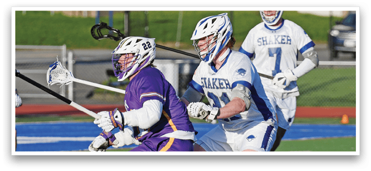 A group of young men playing lacrosse on a field. AI generated content