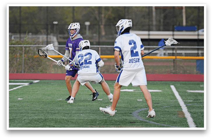 Three men playing lacrosse on a field. AI generated content