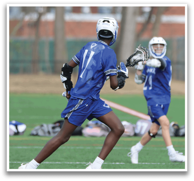 Two boys playing lacrosse on a field. AI generated content