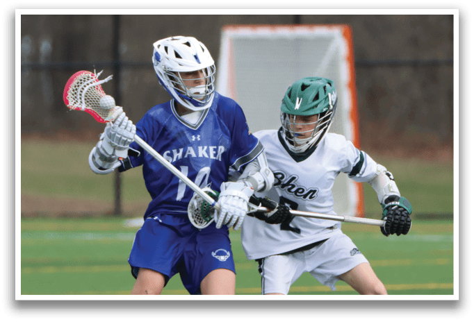 Two young men playing lacrosse on a field. AI generated content
