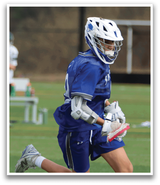 A boy in a blue and white uniform is running on a field. AI generated content