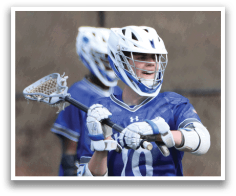 A man wearing a blue and white jersey is holding a lacrosse stick. AI generated content