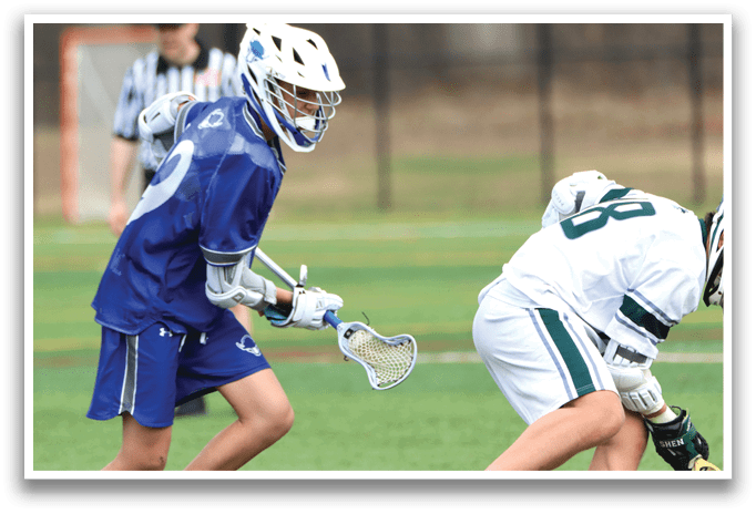 Two young men playing lacrosse on a field. AI generated content