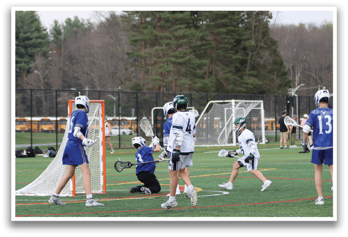A group of people playing a game of lacrosse on a field. AI generated content