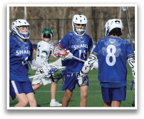 A group of young men playing lacrosse on a field. AI generated content