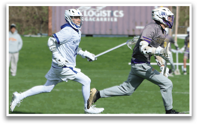 A man running on a field with a blue and white uniform. Description generated by AI