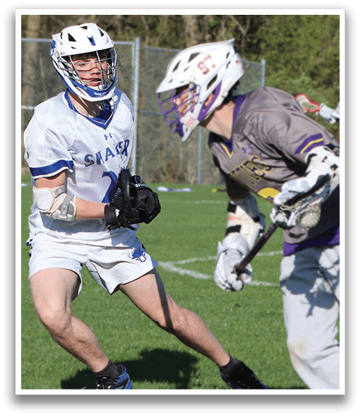 A man wearing a white jersey with the number 2 on it. Description generated by AI
