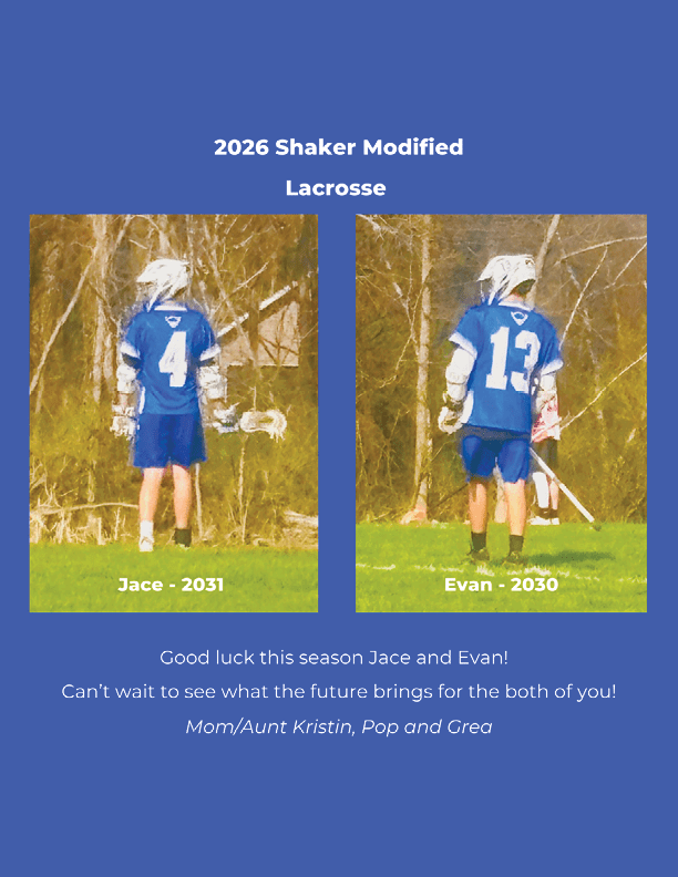 A boy in a blue and white jersey with the number 4 on it. Description generated by AI