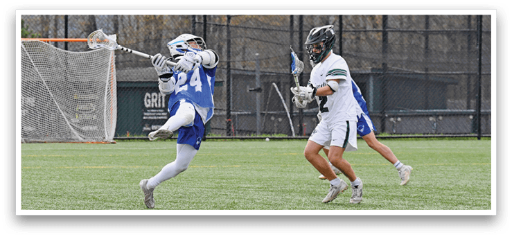 A man in a blue and white uniform is jumping in the air to catch a ball. Description generated by AI