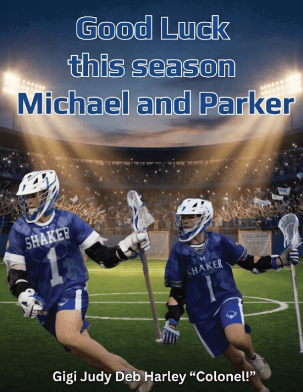 Two lacrosse players in blue uniforms. Description generated by AI
