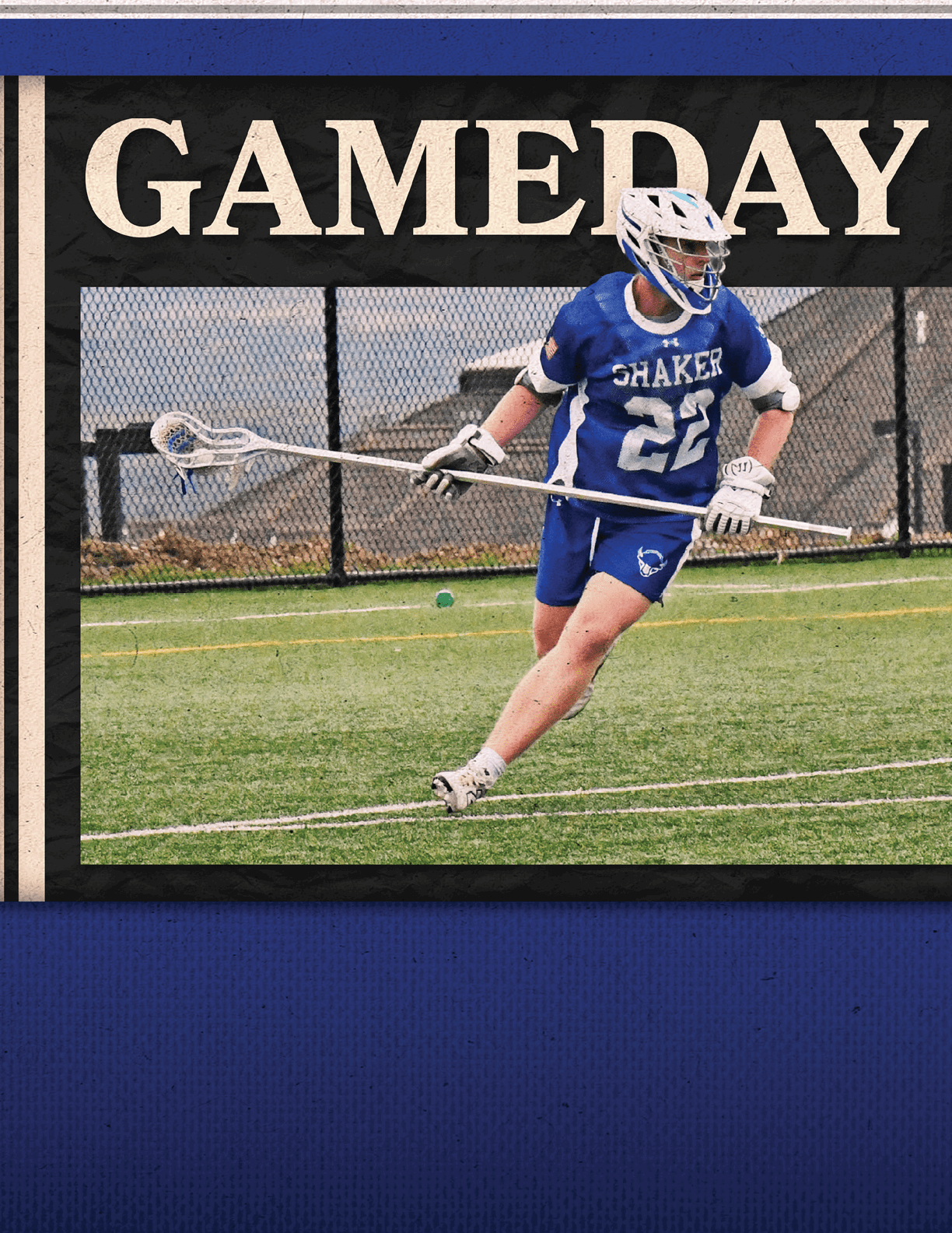 A man wearing a blue and white uniform is playing lacrosse. Description generated by AI