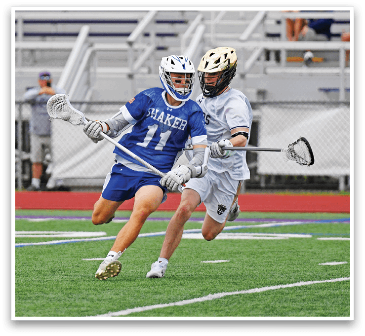 A man in a blue and white uniform is running on a field. Description generated by AI