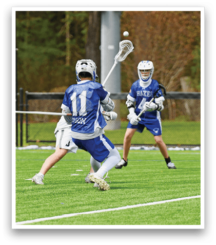 A man in a blue and white uniform is running on a field. Description generated by AI