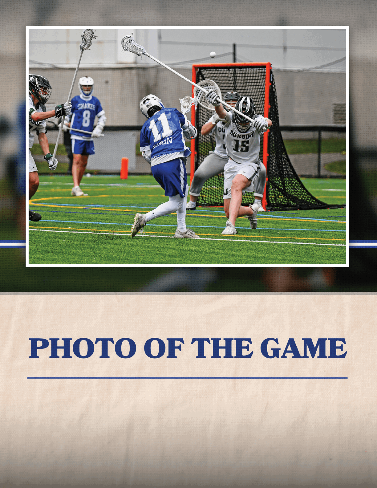 A man in a blue uniform is trying to score a goal. Description generated by AI