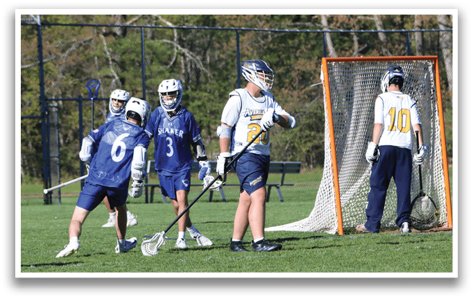 A group of people playing a game of lacrosse. Description generated by AI