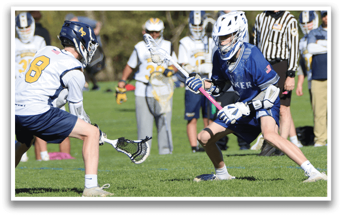 A boy in a blue shirt and white shorts is running on a field. Description generated by AI