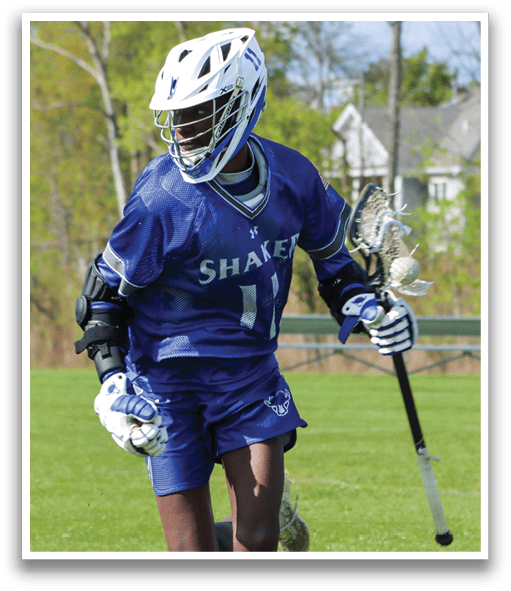 A young man wearing a blue and white jersey with the number 11 on it. Description generated by AI