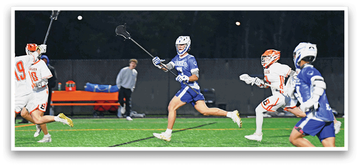 A man in a blue and white uniform is running with a lacrosse stick. Description generated by AI