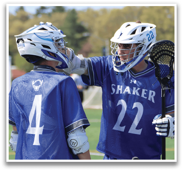Two men wearing blue and white uniforms. Description generated by AI