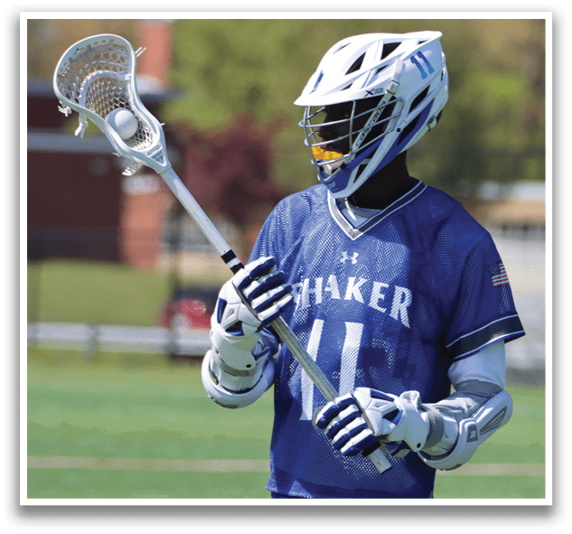 A young man wearing a blue and white jersey with the number 11 on it. Description generated by AI