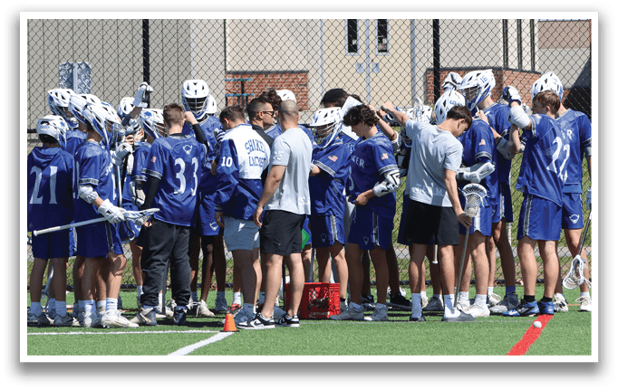 A group of people wearing blue and white uniforms. Description generated by AI