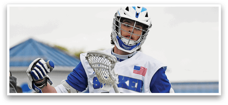A man wearing a white and blue jersey with the number 12 on it. Description generated by AI