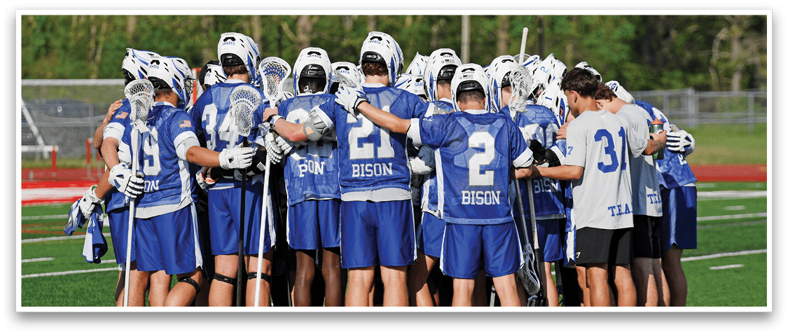 A group of people wearing blue and white uniforms. Description generated by AI