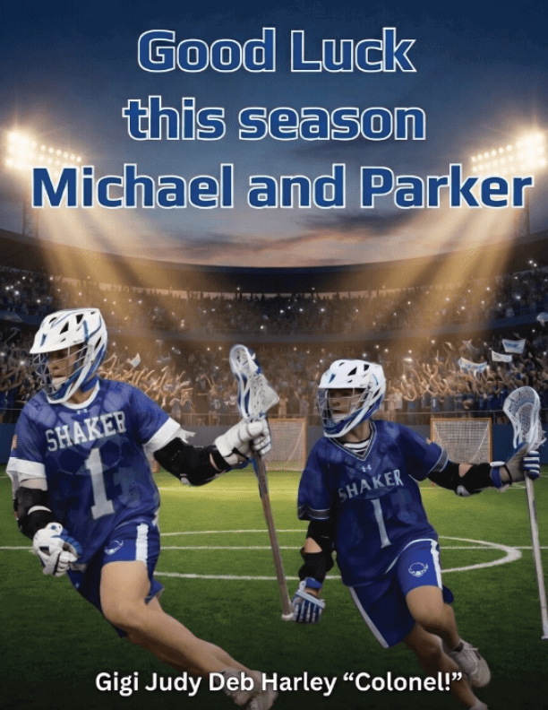 Two lacrosse players in blue uniforms. Description generated by AI