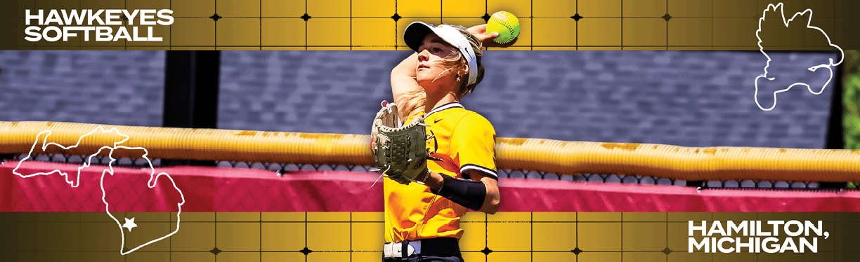 A woman in a yellow shirt and black hat is holding a softball. Description generated by AI