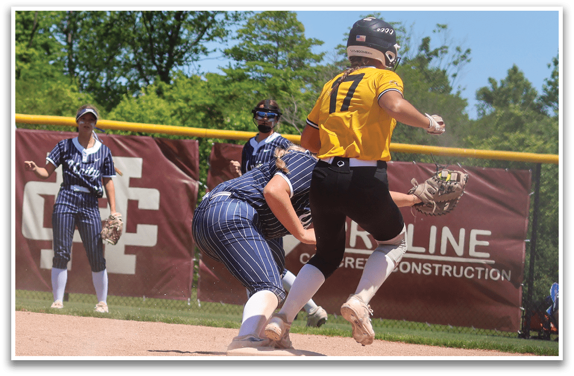 A baseball player slides into home plate. Description generated by AI
