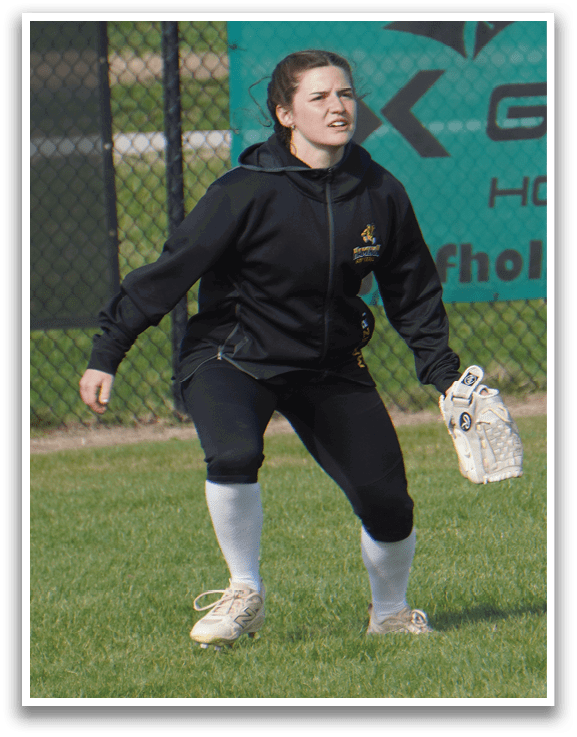 A woman in a black shirt and white socks is playing baseball. AI generated content