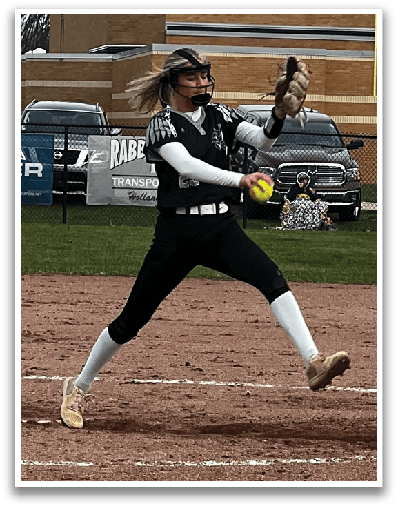 A female baseball player in a black and white uniform is throwing a ball on the field. AI generated content