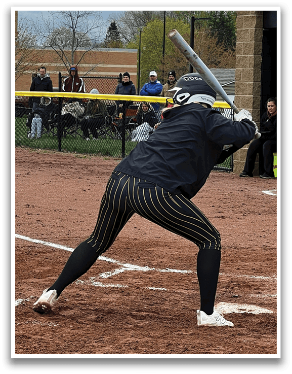 A baseball player is swinging a bat on a field, with a crowd of people watching. AI generated content