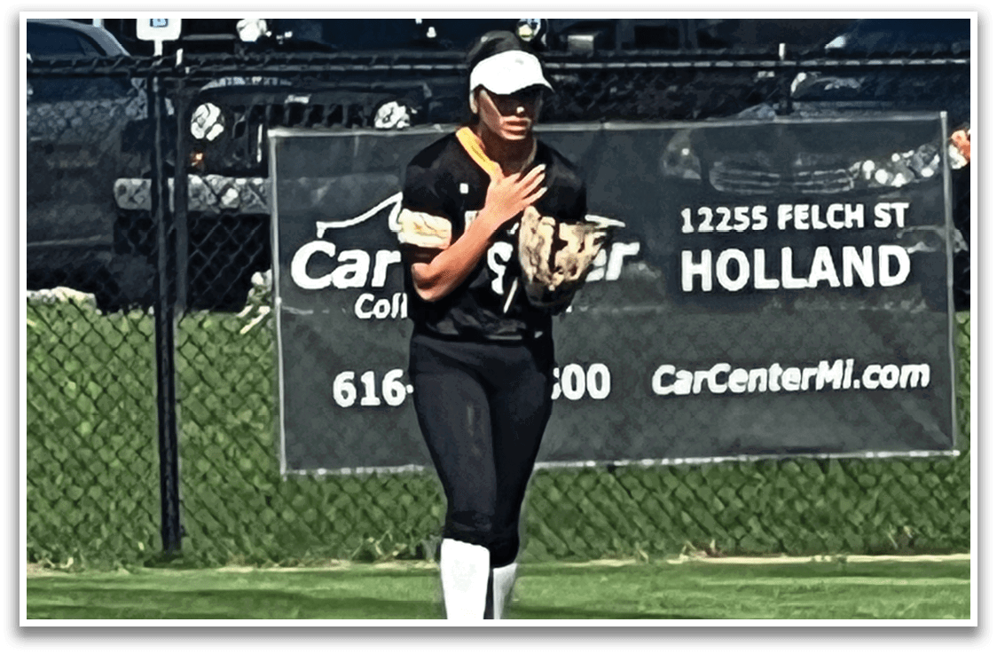 A woman wearing a black and white uniform is standing on a field. AI generated content