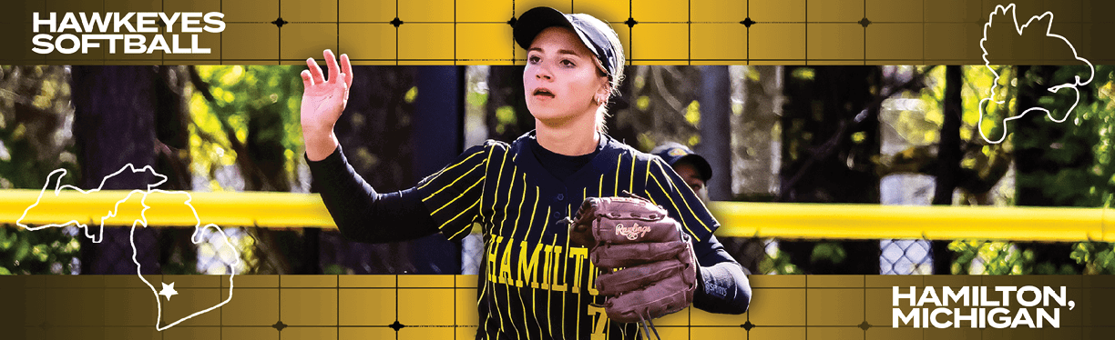 A woman wearing a black and yellow shirt and a black hat. Description generated by AI