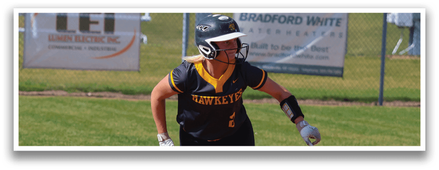 A woman wearing a black and yellow shirt is running on a baseball field. Description generated by AI
