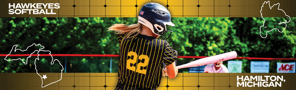 A woman wearing a black and yellow jersey is swinging a bat. Description generated by AI