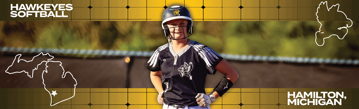 A woman wearing a softball uniform and helmet. Description generated by AI