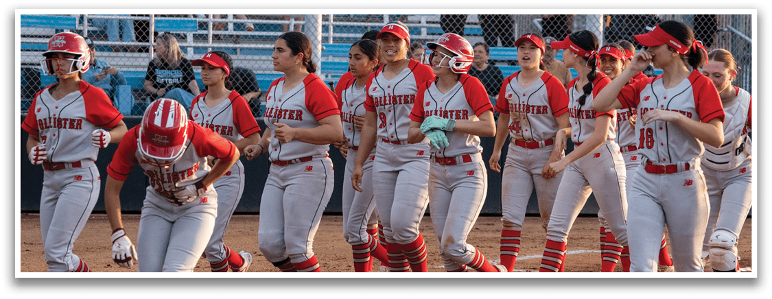 A group of female baseball players wearing red and white uniforms are walking on a field. AI generated content