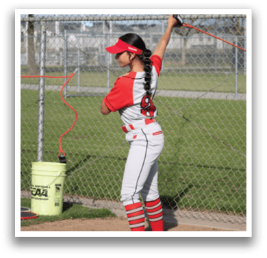 Two women are playing baseball in a field. One woman is holding a bat and swinging it, while the other woman is holding a ball. AI generated content