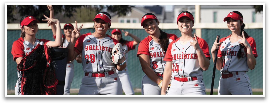 A group of women wearing red and white uniforms are standing on a field. AI generated content